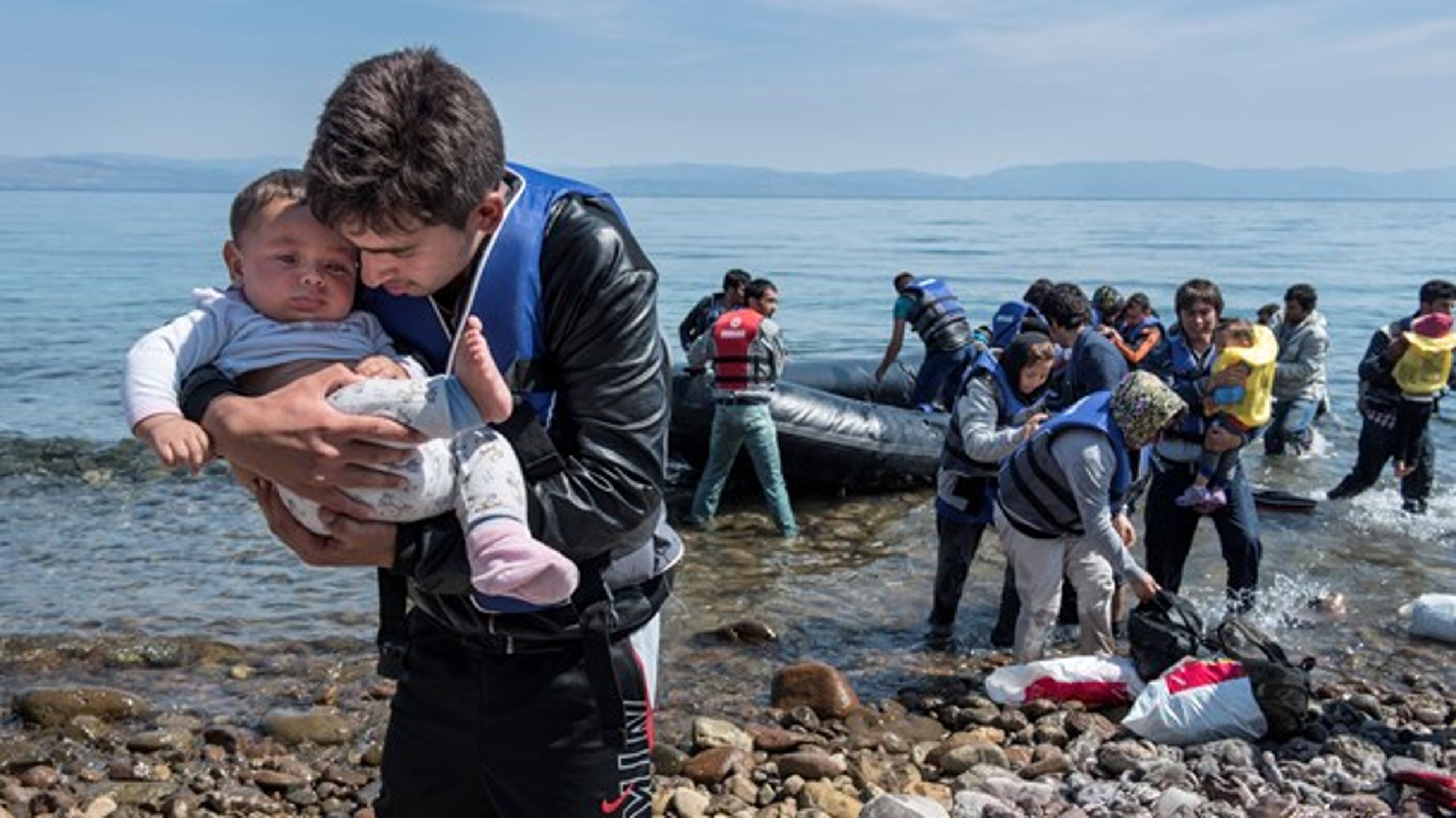 Afghanske flygtninge kommer i land på den græske ferieø Lesbos i 2015.